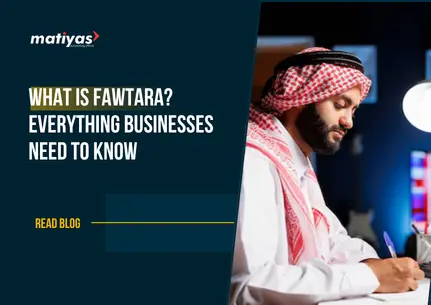 Saudi business professional managing digital invoices and Fawtara e-Invoicing compliance on a desktop computer.